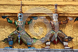 Ramakien figures on the golden chedi