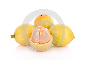 Rambeh tropical fruit with leaf on white background.