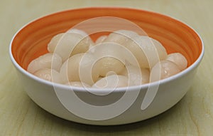 Rambutan, Asian fruit fresh peeled and served in bowl