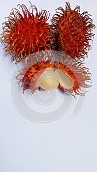Rambutan fruit, a tropical fruit originating from Indonesia isolated on a white background
