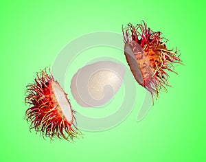 Rambutan isolated from the shell on the green blackground.