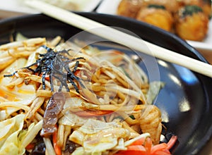 RAMEN: Japanese style fried noodle with chicken squid fresh vegetable and sesame oil