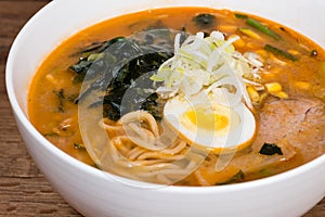 Ramen miso of Meat with pork, soy milk, pork broth,.black mushrooms, eggs, onions, corn, carrots and courgettes