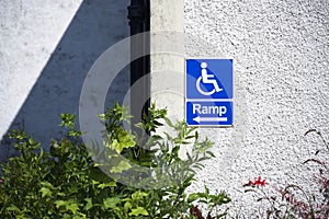 Ramp access for disabled wheelchair users sign at entrance