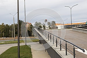 A ramp for cars to enter from an underground parking lot to a multi-storey residential building