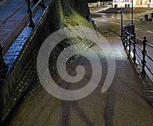 The ramp down to the seaside promenade in the town of Cromer at night