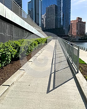 Ramp leading away from the Chicago River riverwalk towards Wacker Drive