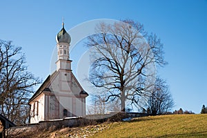 Ramsach church near Murnau, at the end of winter season, upper bavaria photo