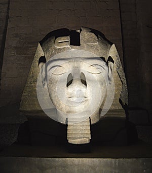 Ramses II head at Luxor Temple at night