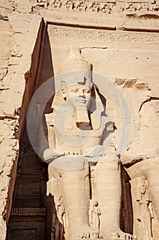 Ramsses II or Ramsses the Great statue carved in rock mountain at Abu Simbel Temple Egypt