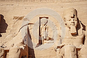 Ramsses the second or Ramsses the Great and Horus statues carved in rock at Abu Simbel Temple