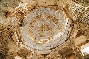 Ranakpur Jain Temple, main domed ceiling and finely carved marble columns with bas-reliefs, Rajasthan photo