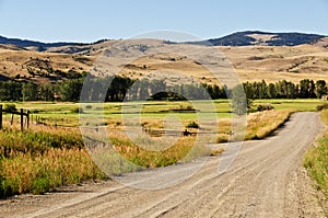 Ranch Land Along a Gravel Road photo