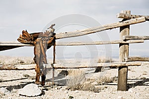 Ranch - saddle on fence