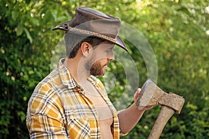 rancher with axe outdoor. image of rancher with axe. rancher with axe. rancher with axe