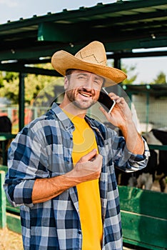 Rancher in hat and plaid shirt