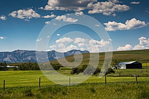 Ranching farm along the Eastern slopes of the Canadian Rocky Mountains and future coal mining development