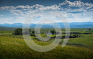 Ranching farm along the Eastern slopes of the Canadian Rocky Mountains and future coal mining development