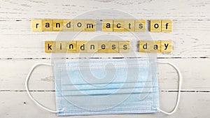 Random Acts of Kindness Day.words from wooden cubes with letters photo.