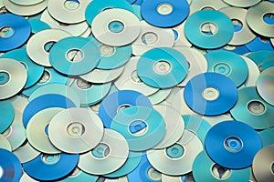 Random arrangement of metallic DVD and CD data storage disks