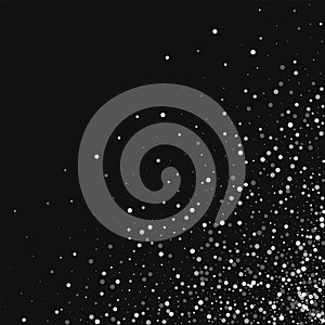 Random falling white dots. Scattered bottom right