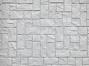 Random modern design square stone brick block pattern texture wall background.