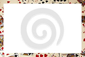 Random playing cards together forming a background