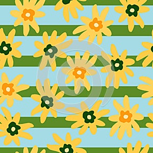Random seamless pattern with yellow ditsy flowers print on reen and blue striped background