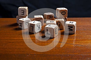 Random wooden letter dices