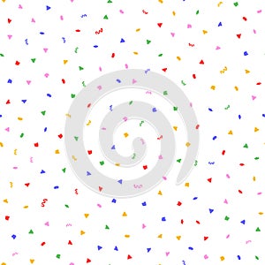 Randomly scattered colorful confetti. Festive seamless pattern.