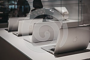 Range of MacBooks on display inside Apple Museum in Prague,Czech Republic
