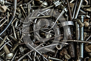 Range Rusty old screws bolts nuts. Grunge metal Hardware details