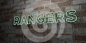 RANGERS - Glowing Neon Sign on stonework wall - 3D rendered royalty free stock illustration