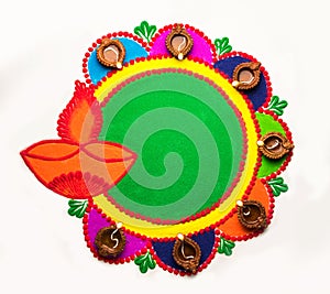 Rangoli design made with colourful powder for Diwali, Pongal, Onam festivals in India