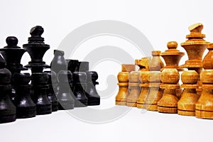 The ranks of the war troops in the game of chess seem to face each other