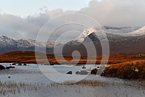 Rannoch Moor at sunrise with snow on mountains