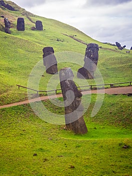 Rano Raraku volcano, the quarry of the moai with many uncompleted statues. Rapa Nui National Park, Easter Island, Chile. UNESCO