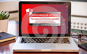 Ransomware attack concept. Ransomware text on a laptop screen
