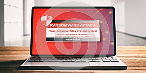 Ransomware, virus attack alert on a computer laptop screen, wooden desk, blur office background, front view