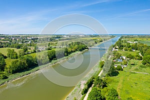 The Ranville bridge over the Orne canal in Europe, France, Normandy, towards Caen, Ranville, in summer, on a sunny day photo