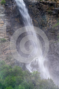 Mountain waterfall by Ranwu Lake in summer photo