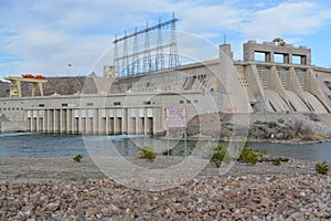 Rapid Changes in Water Level and Do Not Enter the Water sign overlooking the spillway of the Davis Dam in Laughlin, Clark County,