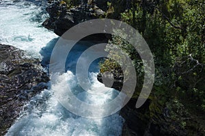 Rapid clear water of Abiskojokk river in Abisko National Park in northern Sweden