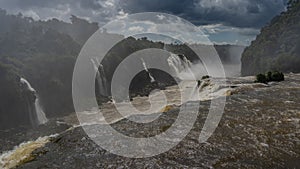 The rapid flow of water collapses from the edge of the ledge into the riverbed. photo