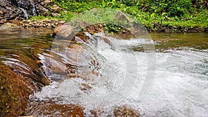 rapid flow of water in the village river