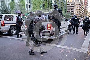 Rapid response mobile police unit during civil disobedience event, in Portland, Oregon.