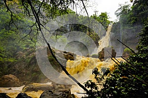 Rapid rocky water stream captured high angle.