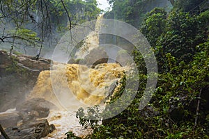 Rapid rocky water stream captured high angle.