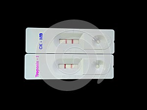 Rapid test device or cassette for Troponin I and CK MB test, showing positive result.