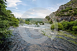 Rapids in the Krka River above the Roski Slap waterfalls in Croatia